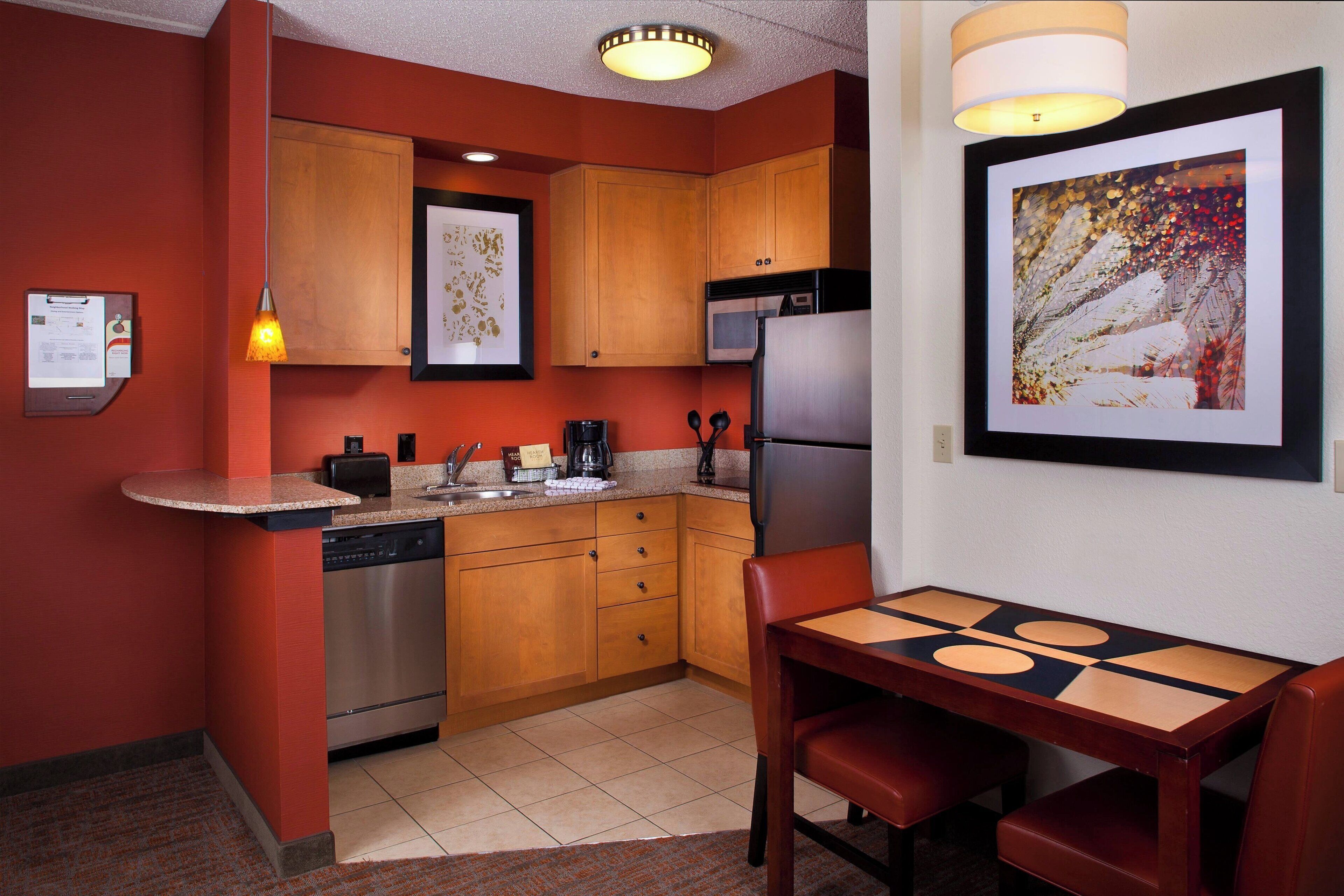 fridge, microwave, coffee/tea maker, cookware/dishes/utensils