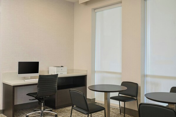 A hotel room with a desk, two chairs, a computer, and a window. - Residence Inn Tallahassee Universities at the Capitol (Tallahassee)
