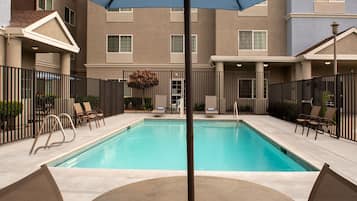 Outdoor pool, open 10:00 AM to 9:00 PM, pool loungers