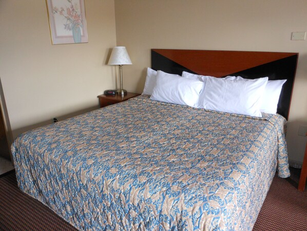 Premium bedding, down duvets, desk, laptop workspace