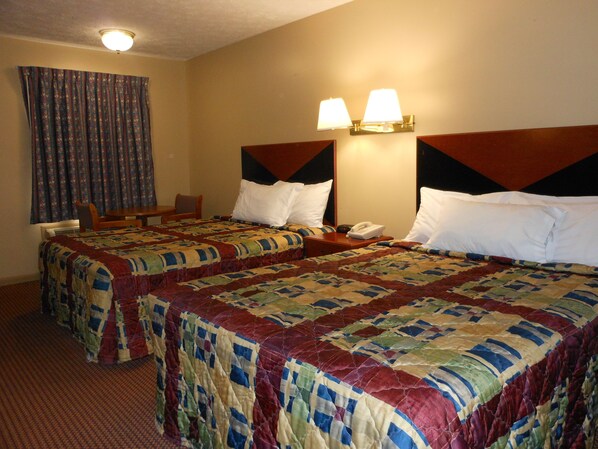 Premium bedding, down duvets, desk, laptop workspace