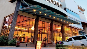 A hotel with a prominent "Ascott" sign, large windows, and a modern architectural design. - Ascott Gurney Penang (George Town)