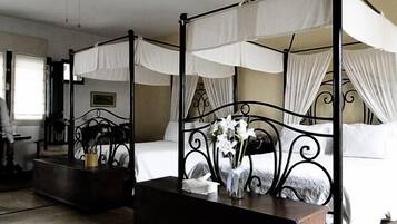 Suite | Ropa de cama de alta calidad y caja de seguridad en la habitación