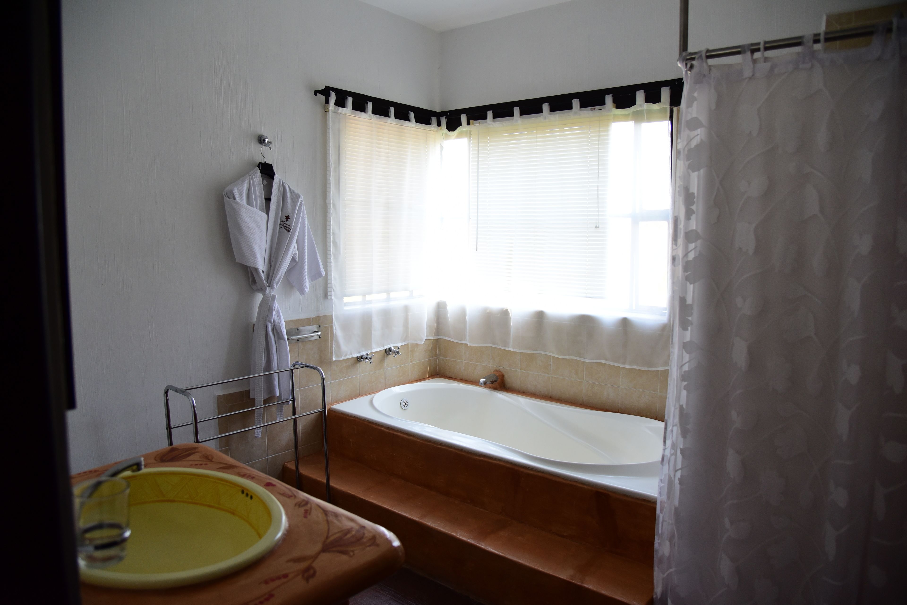 classic room | bathroom | shower, designer toiletries, hair dryer, bathrobes
