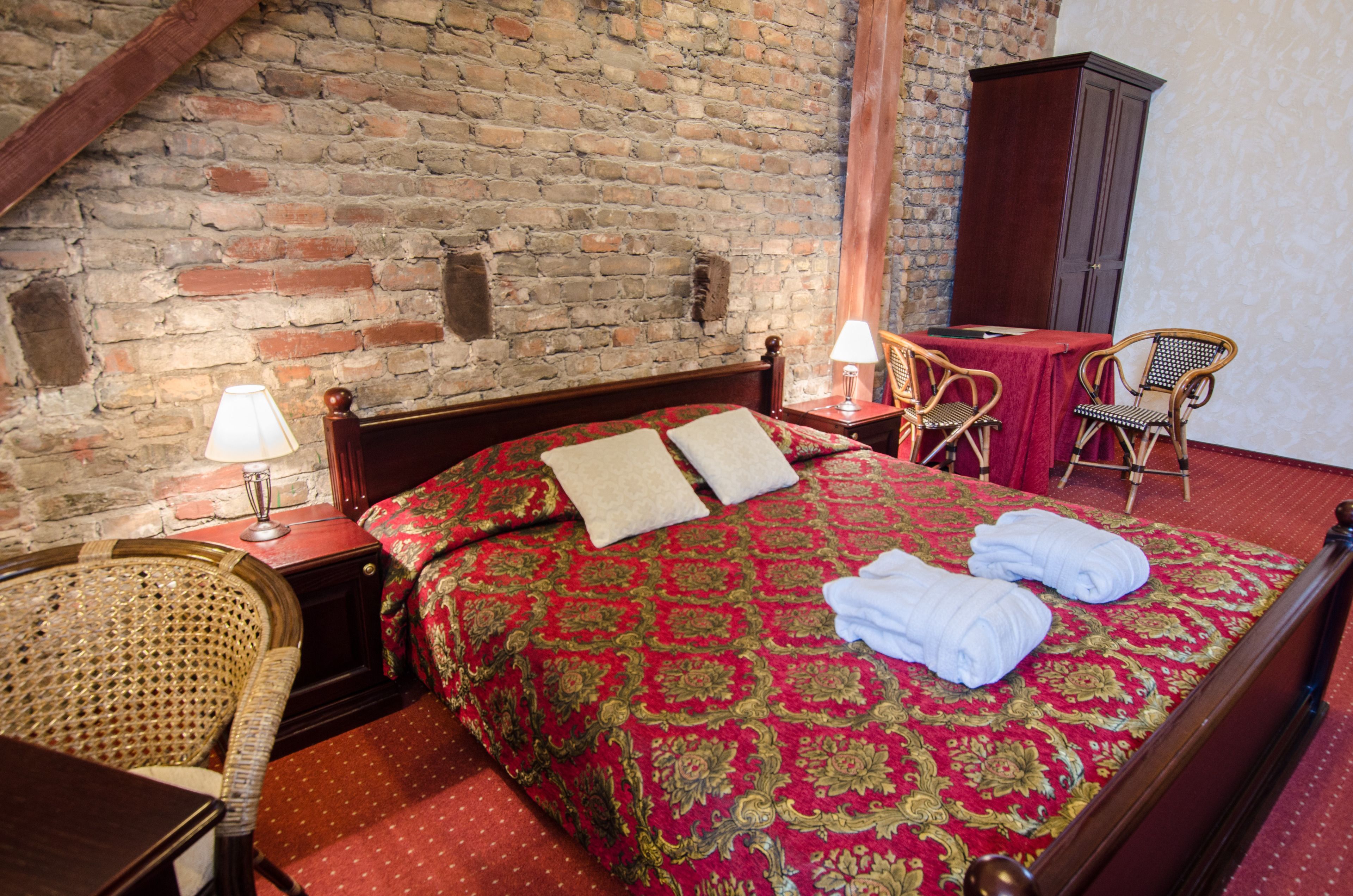 Junior-suite | Minibar, pengeskab på værelset, skrivebord, mørklægningsgardiner