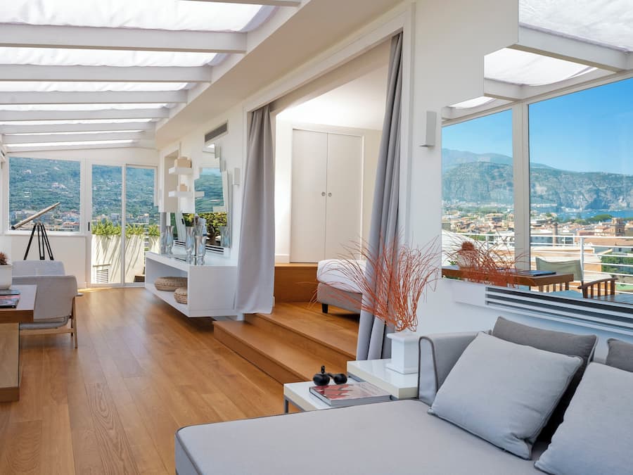 Executive Suite, Terrace, Sea View | Minibar, in-room safe, desk, blackout drapes