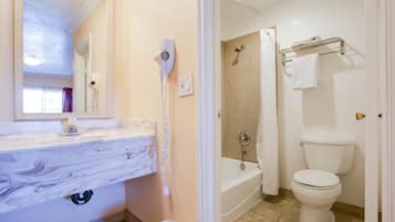 Standard Room, 1 King Bed | Bathroom | Combined shower/tub, free toiletries, hair dryer, towels