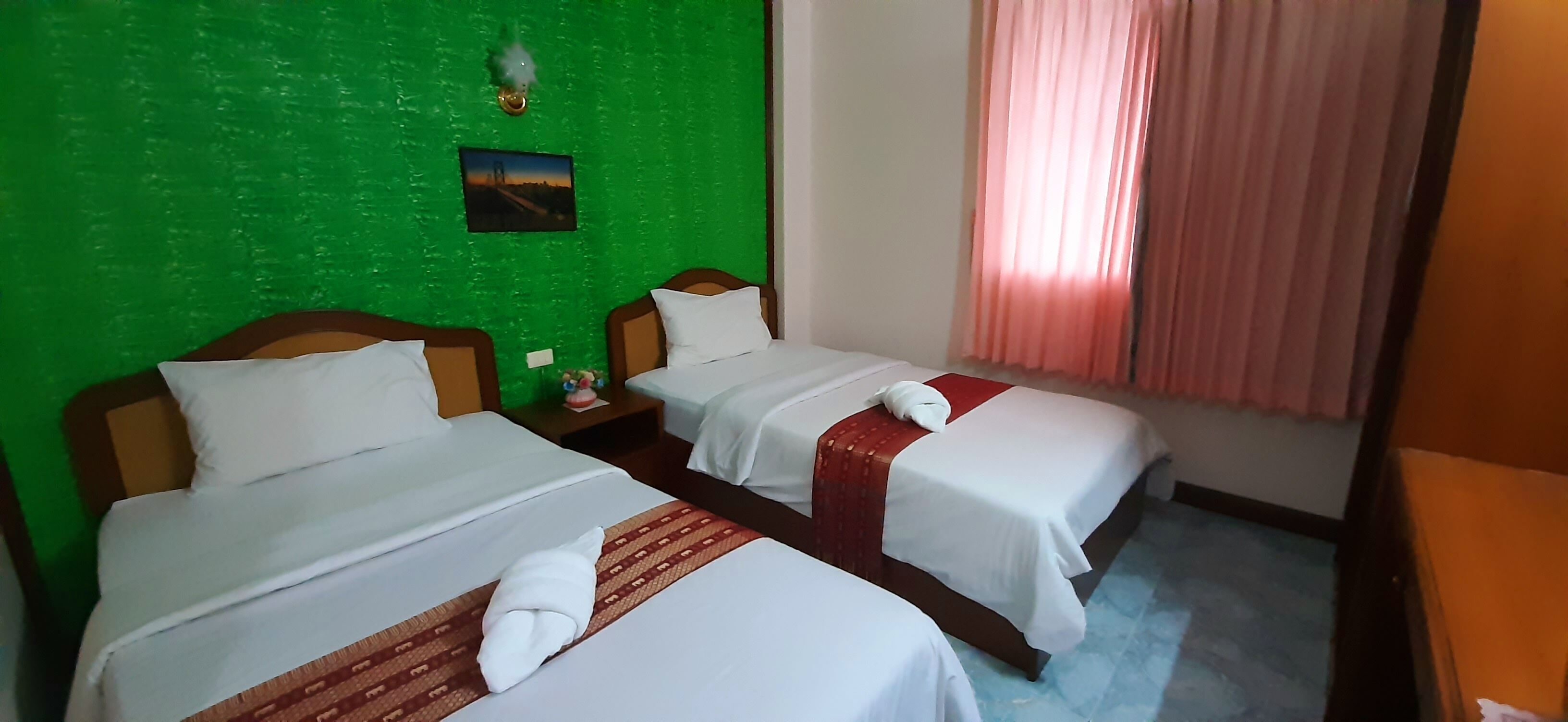 Desk, blackout curtains, free WiFi, bed sheets