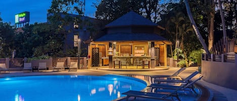 2 outdoor pools, open 7:00 AM to 7:00 PM, pool umbrellas, sun loungers