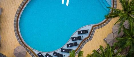 2 outdoor pools, open 7:00 AM to 7:00 PM, pool umbrellas, pool loungers