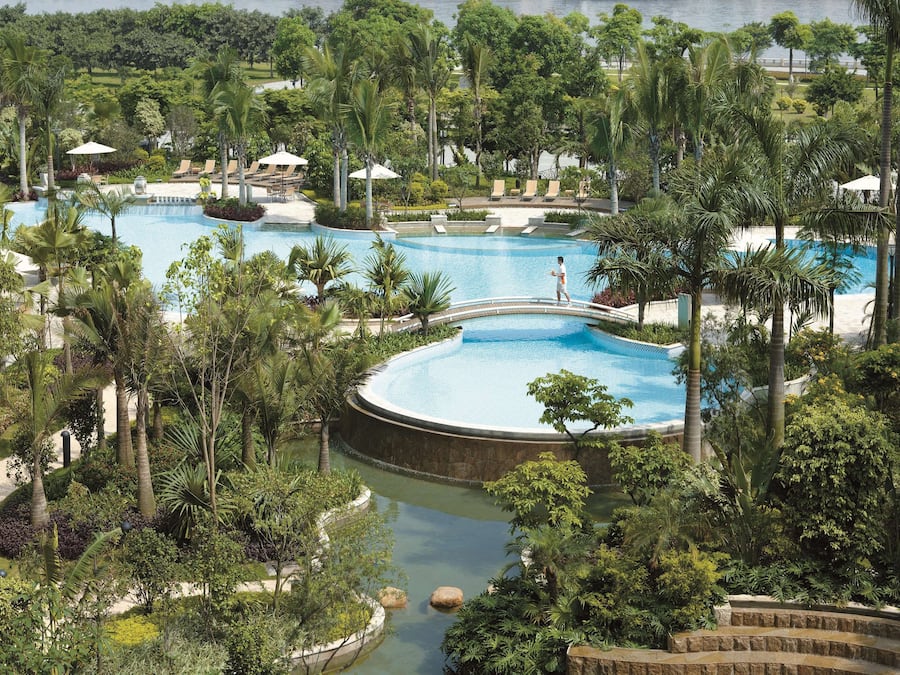 Indoor pool, seasonal outdoor pool, pool umbrellas, sun loungers