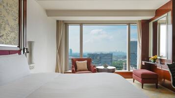 Premium bedding, down comforters, free minibar items, in-room safe