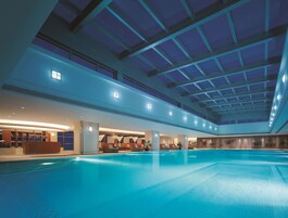 Indoor pool, seasonal outdoor pool, pool umbrellas, pool loungers