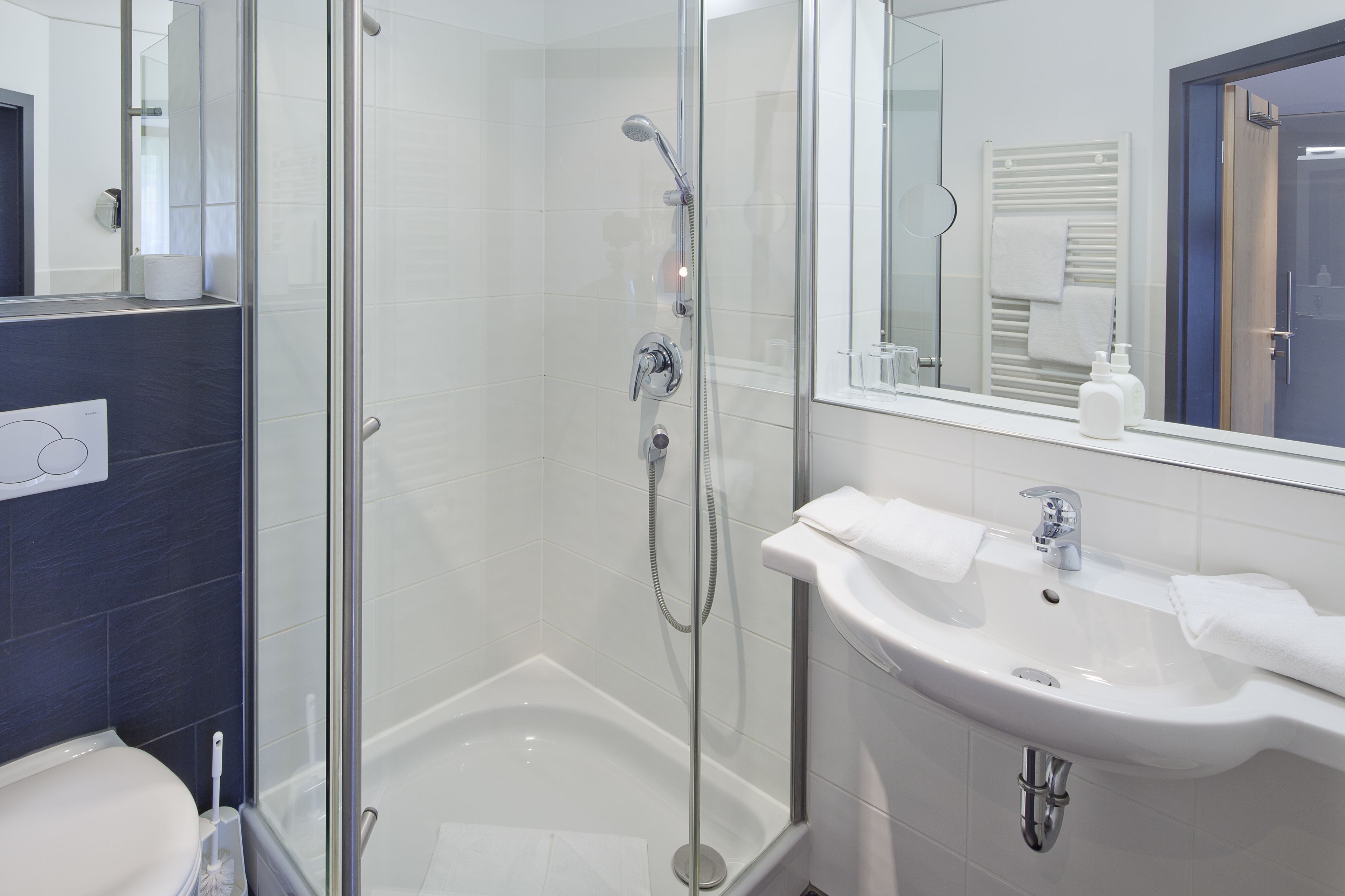 shower, free toiletries, hair dryer, bathrobes