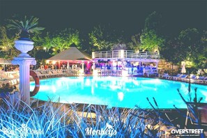 Seasonal outdoor pool, open 9:00 AM to 7:00 PM, pool umbrellas