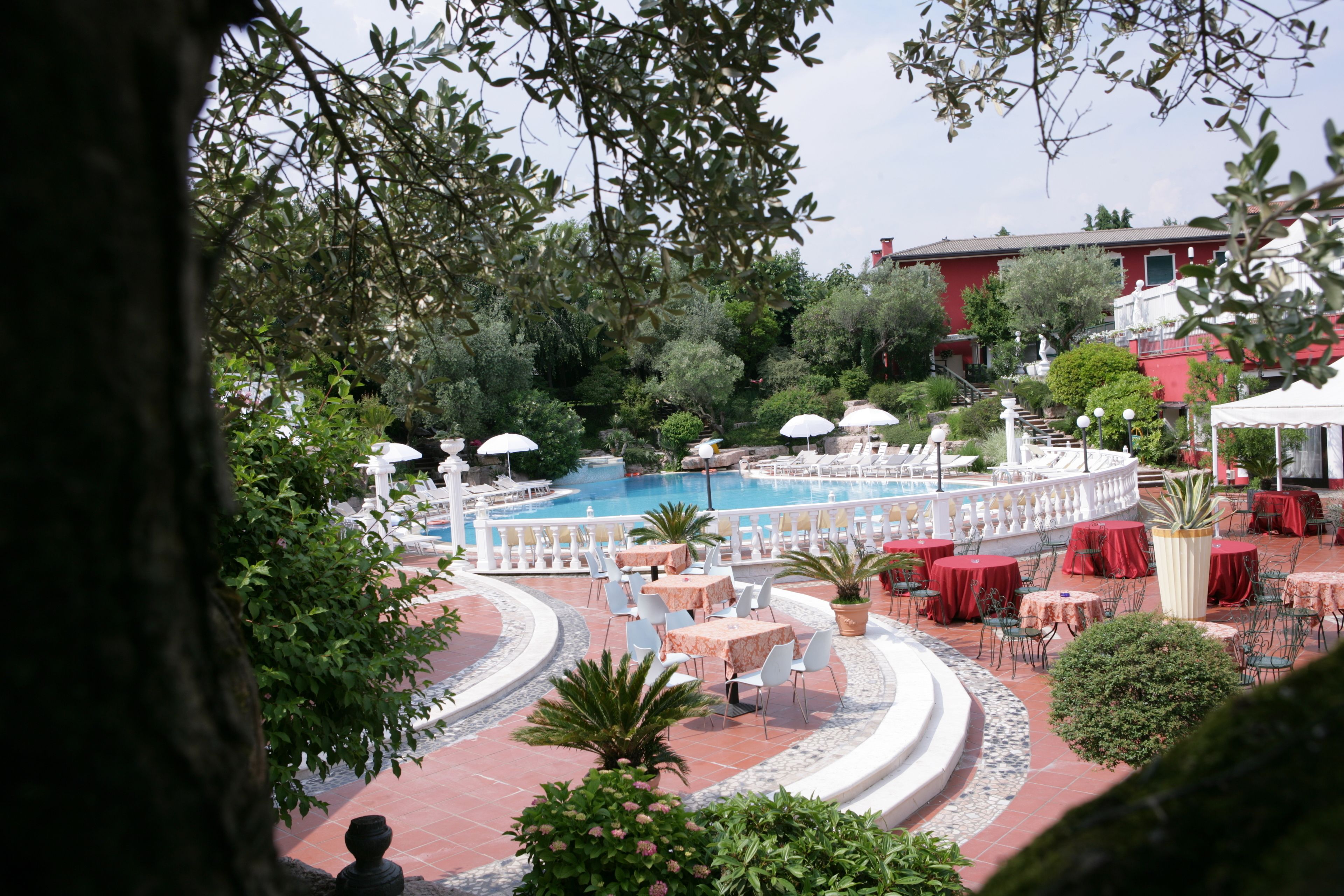 Seasonal outdoor pool, open 9:00 AM to 7:00 PM, pool umbrellas