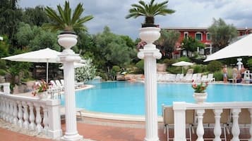 Seasonal outdoor pool, pool umbrellas, pool loungers