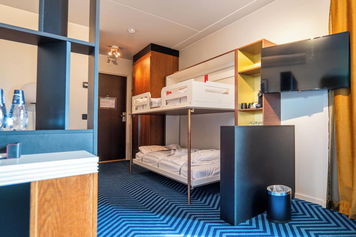 Premium Room Four | In-room safe, desk, laptop workspace, blackout drapes