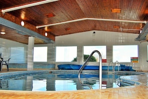 Indoor pool, outdoor pool, open 7:00 AM to 10:00 PM, pool loungers