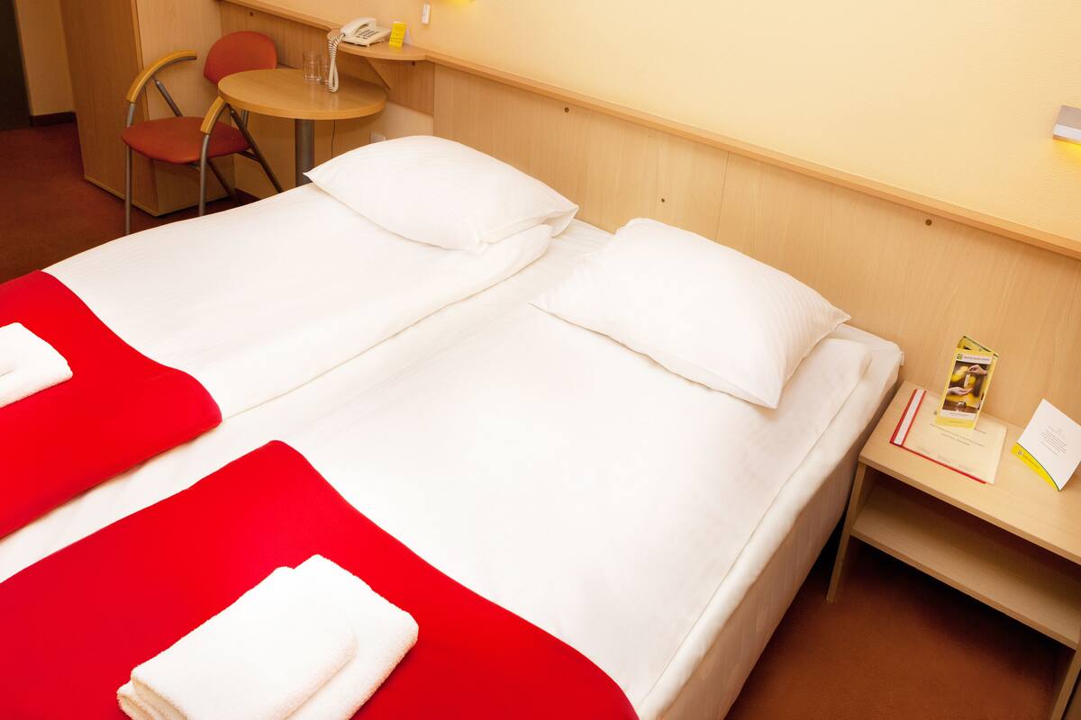 In-room safe, desk, blackout curtains, iron/ironing board (on request)