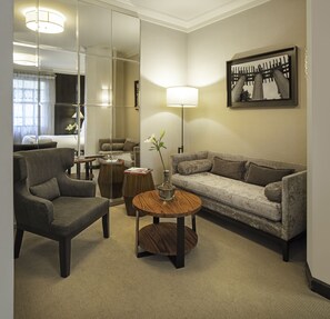 Superior Room | Living area | 32-inch flat-screen TV with cable channels, TV