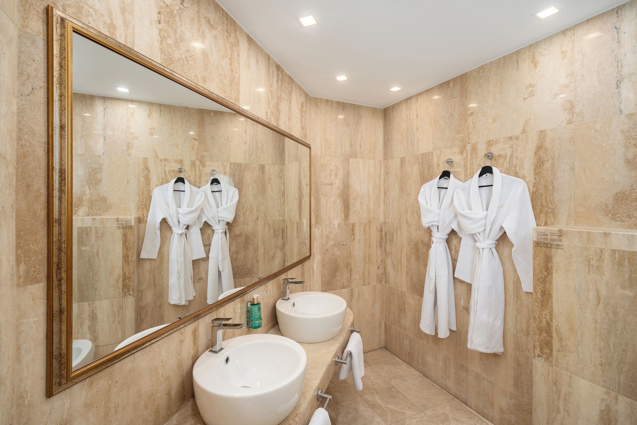 suite, 1 king bed, corner | bathroom | bathtub, hair dryer, bathrobes, slippers