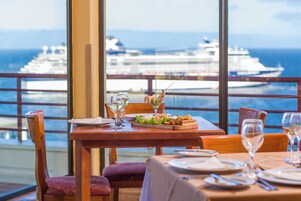 Breakfast, dinner served; local cuisine, sea views