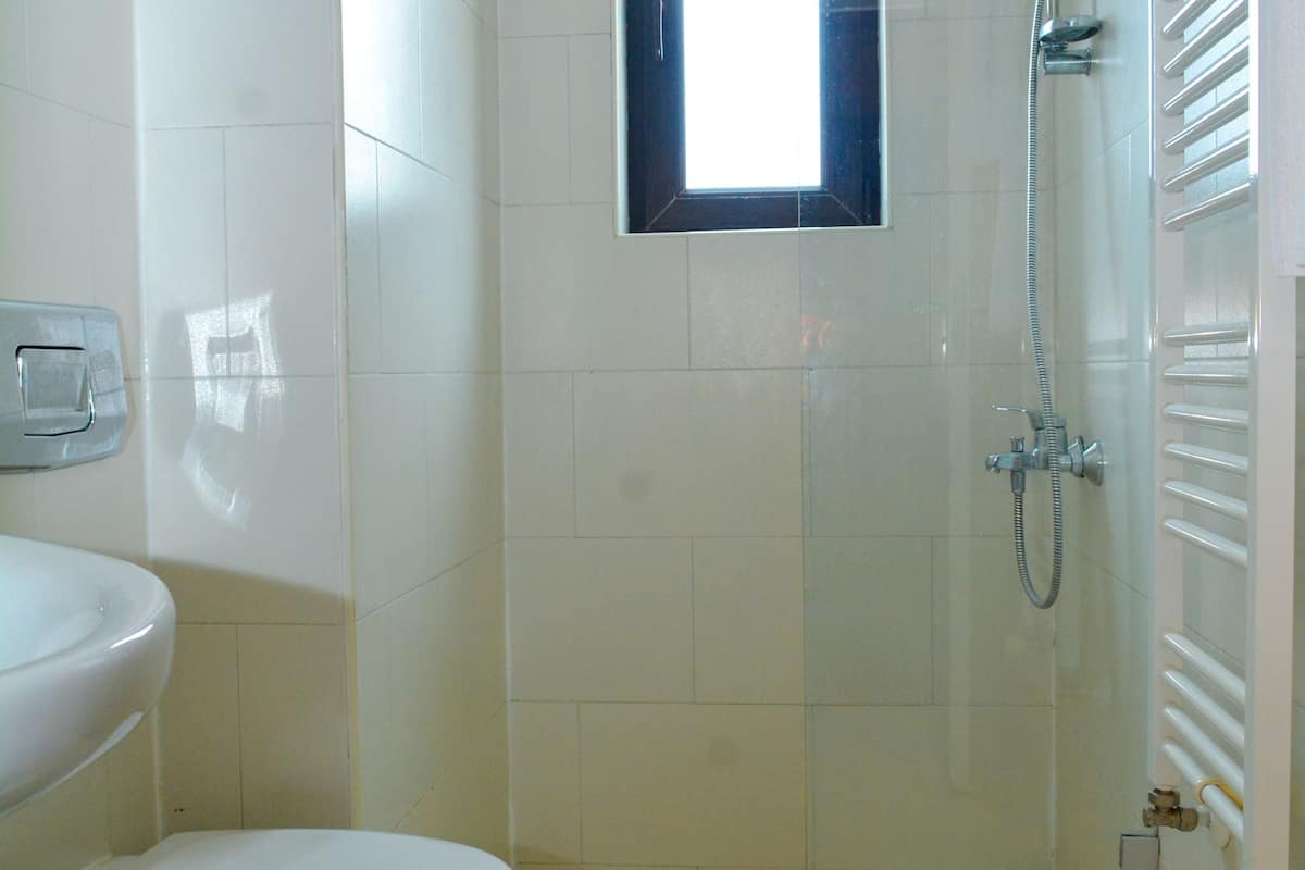 luxury quadruple room | bathroom | hair dryer, towels