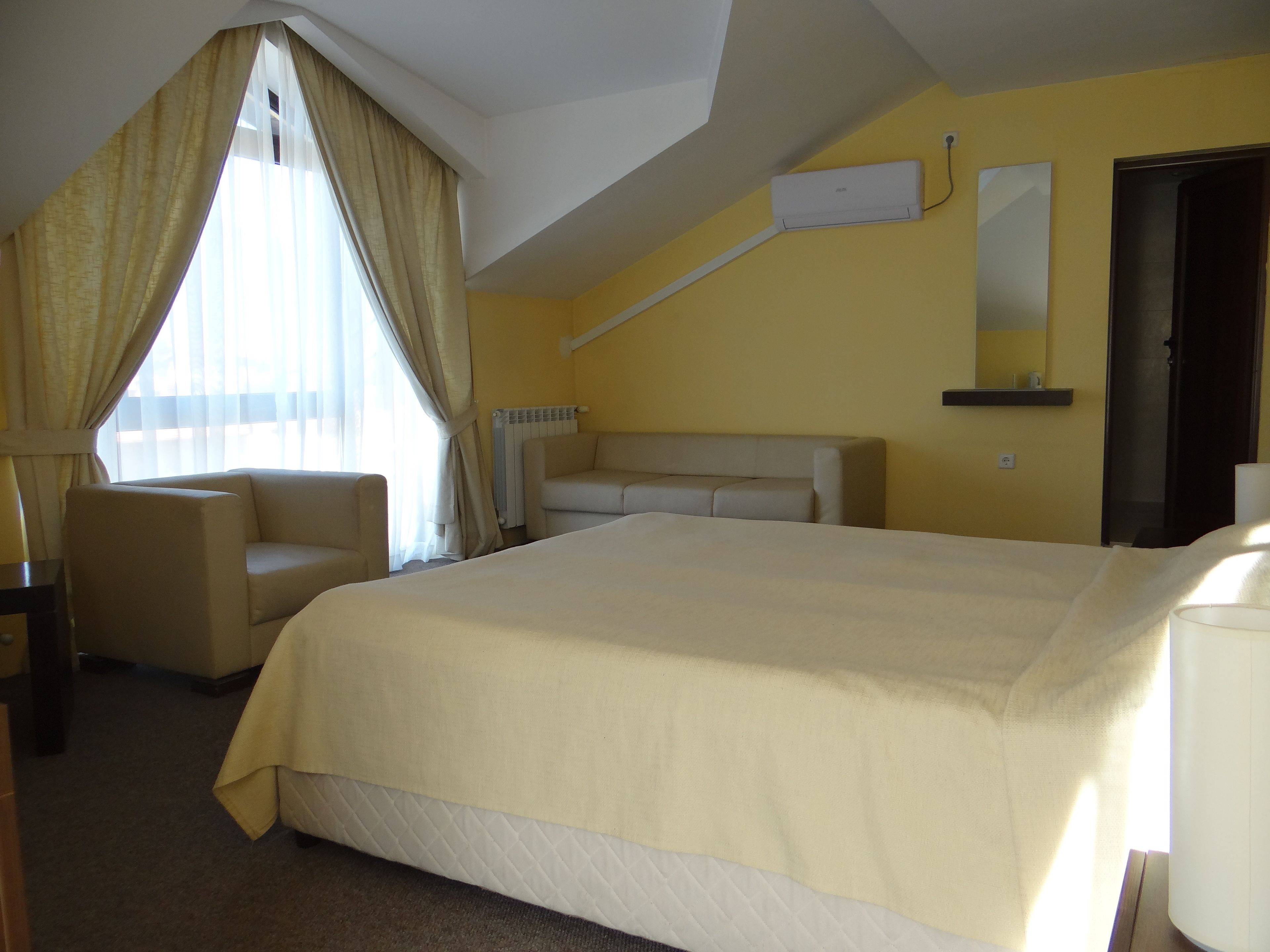 luxury quadruple room | minibar, in-room safe, desk, soundproofing