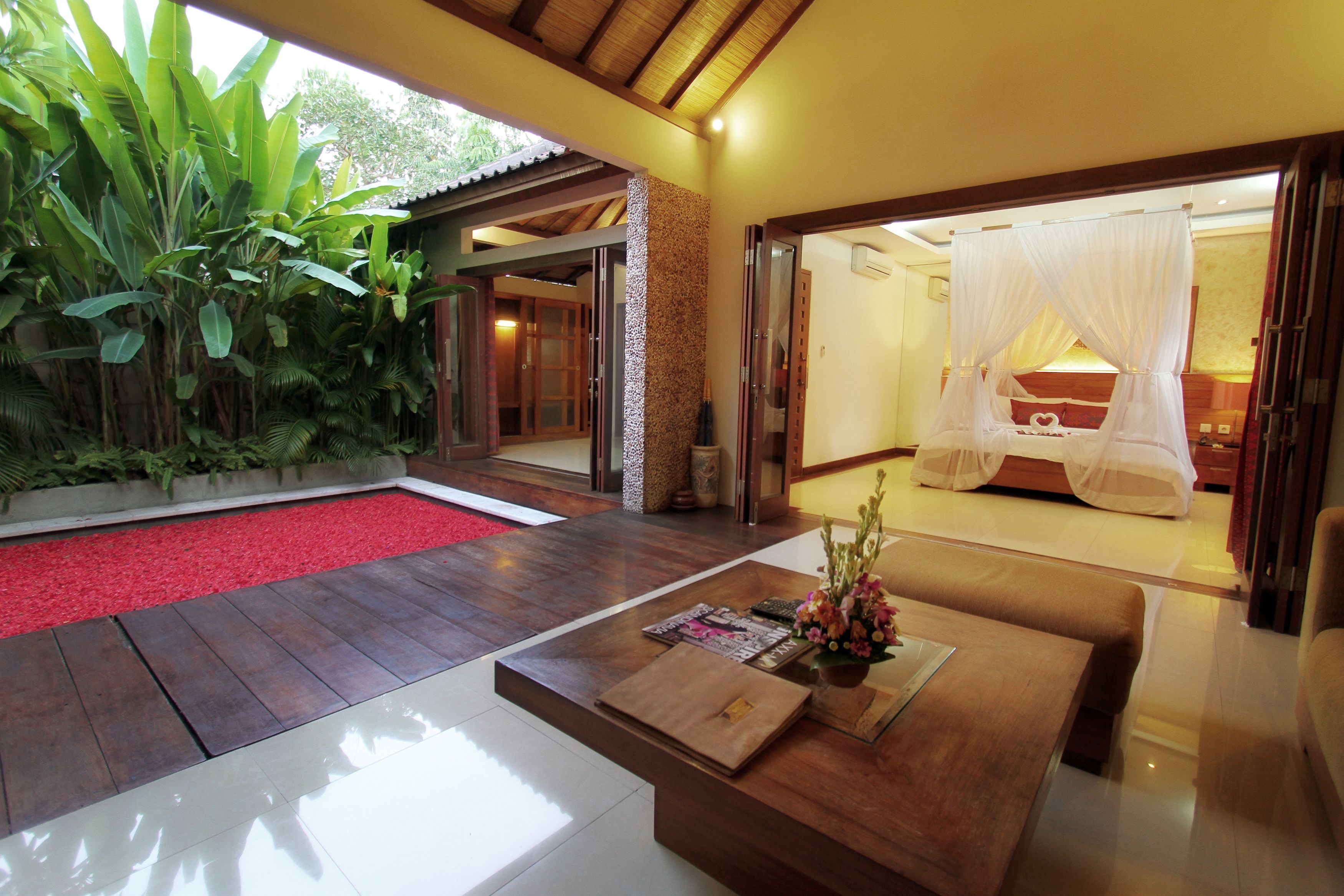 Villa, 1 habitación, alberca privada | Área de sala de estar | Televisión de pantalla plana de 32 pulgadas con canales premium 