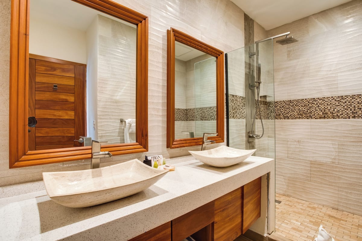one bedroom boutique (no view) | bathroom | shower, rainfall showerhead, free toiletries, hair dryer
