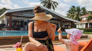 Outdoor pool, pool umbrellas, pool loungers