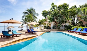 Outdoor pool, pool umbrellas, pool loungers