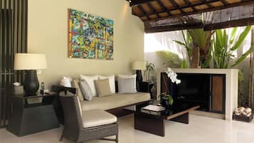 40-inch flat-screen TV with satellite channels, TV