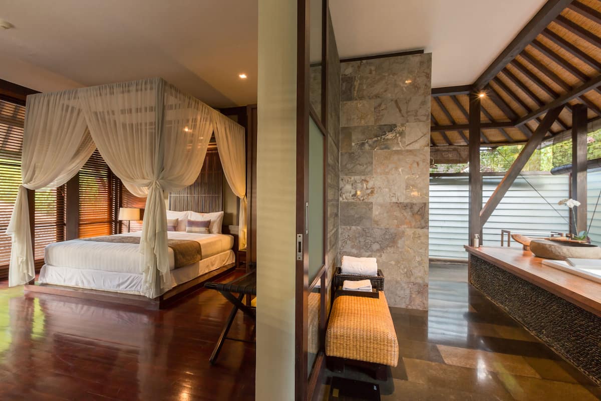 separate bathtub and shower, rainfall showerhead, designer toiletries