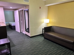 Standard Room, 1 King Bed, Non Smoking (Larger Room) | Living area | 45-inch flat-screen TV with cable channels, TV