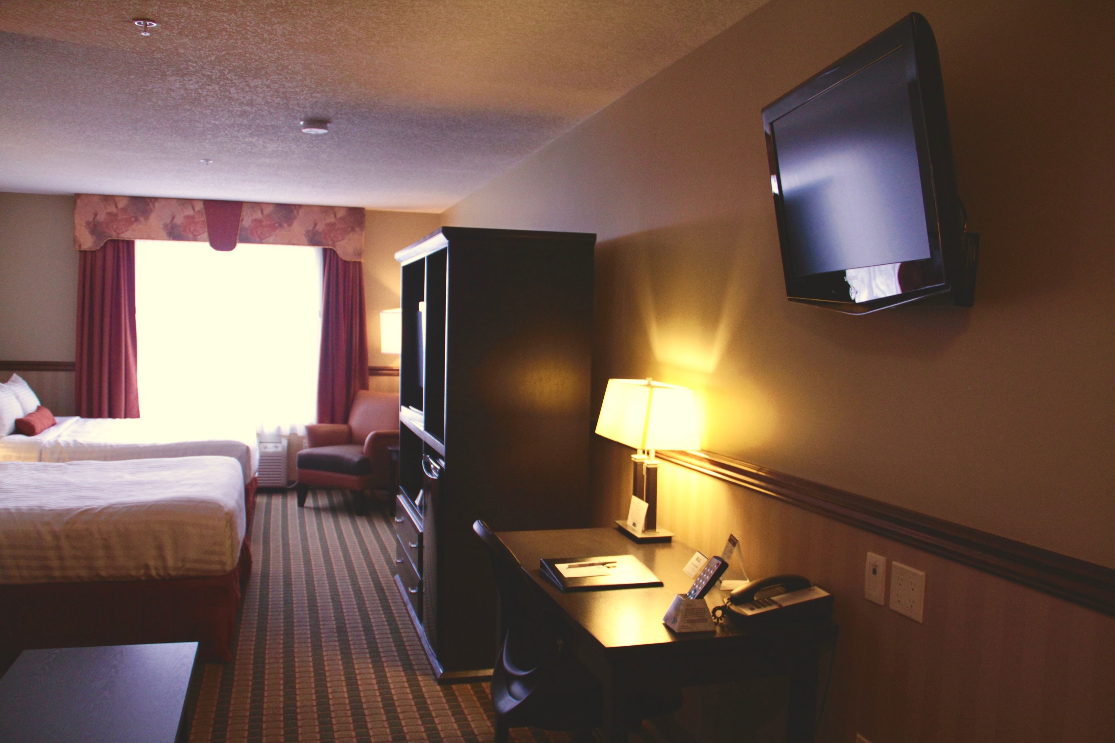 suite, 2 queen beds, non smoking, refrigerator & microwave (third bed is a sofabed) | in-room safe, individually decorated, individually furnished, desk