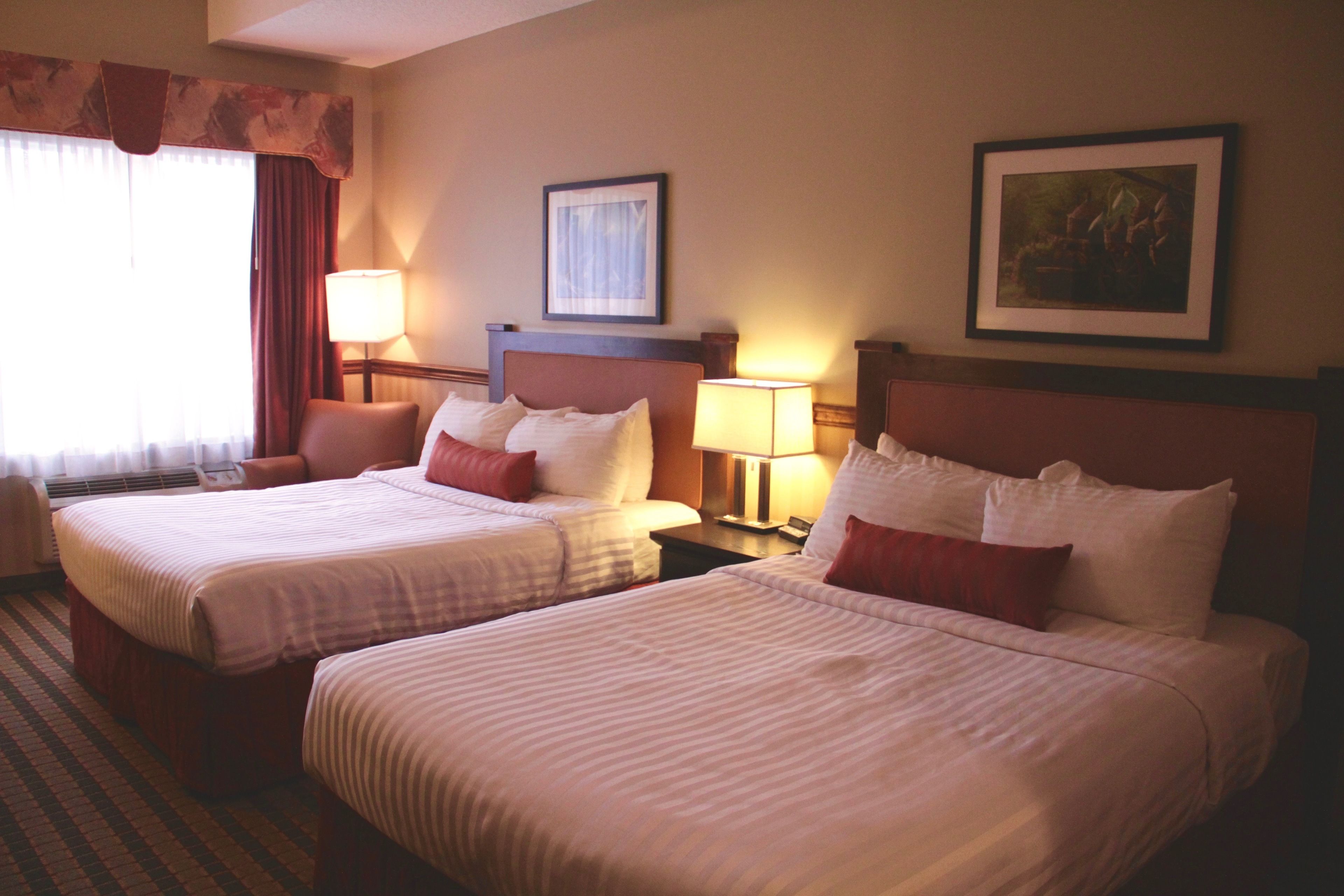 suite, 2 queen beds, non smoking, refrigerator & microwave (third bed is a sofabed) | in-room safe, individually decorated, individually furnished, desk