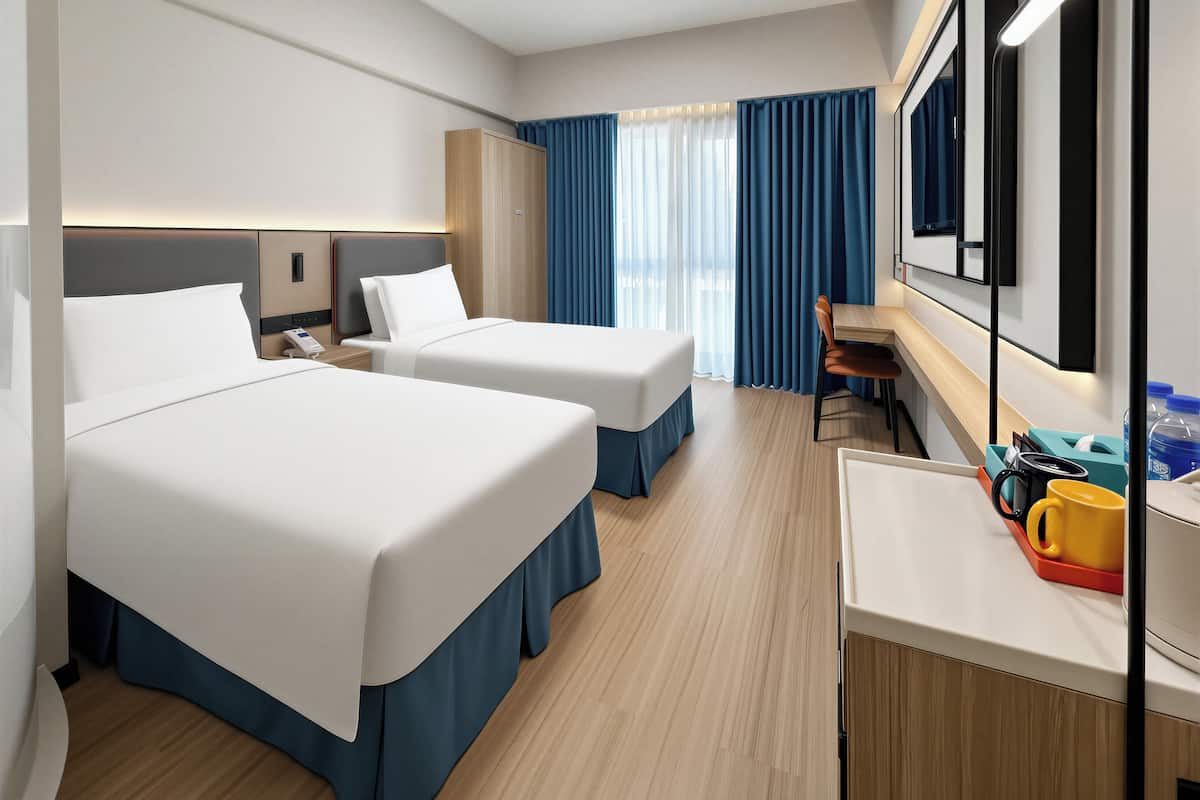 Standaard kamer, 2 eenpersoonsbedden | Hypoallergeen beddengoed, donzen dekbedden, een kluis op de kamer