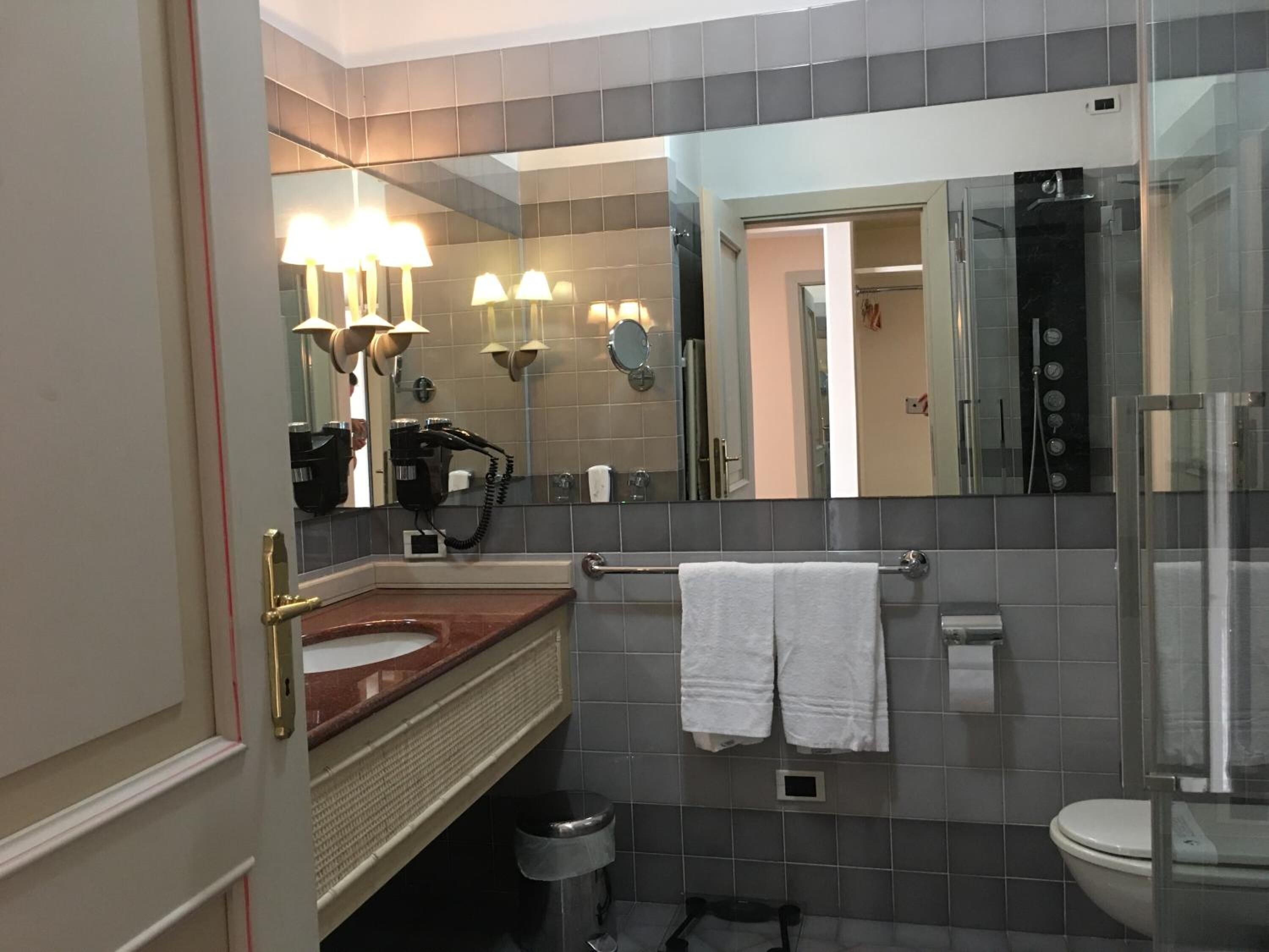 shower, free toiletries, hair dryer, slippers