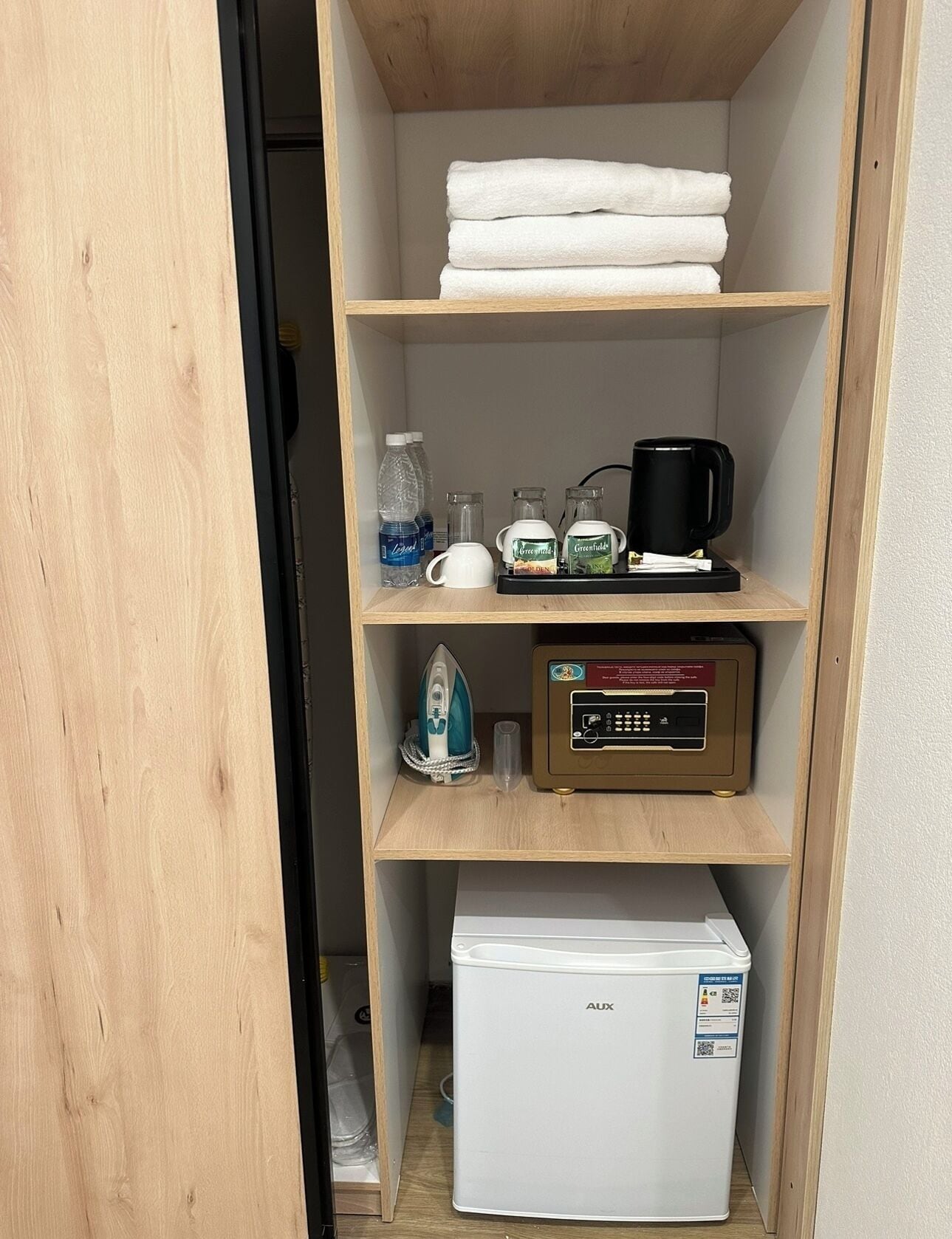 family room | 1 bedroom, minibar, in-room safe, desk