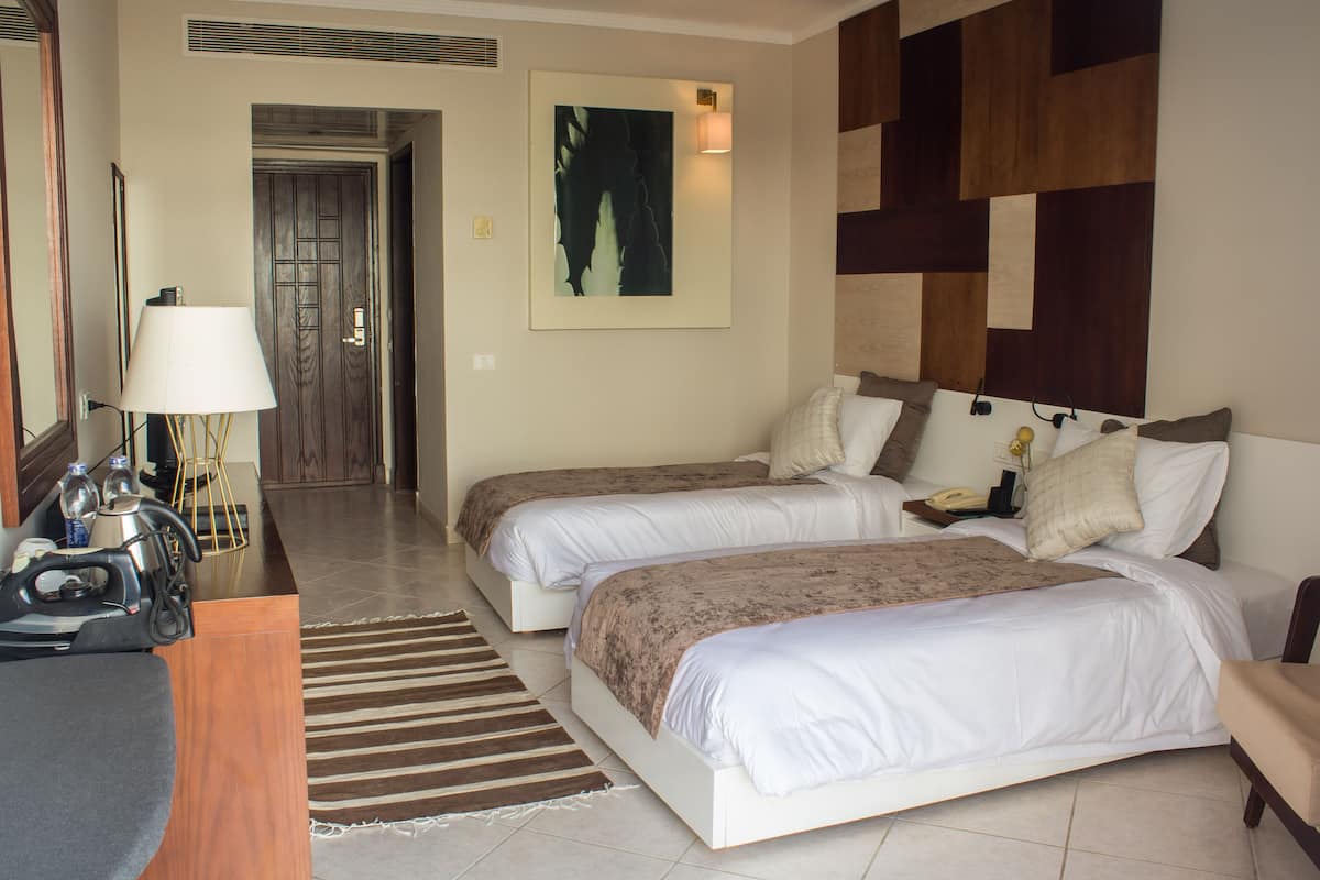 Superior Double Room | Minibar, in-room safe, iron/ironing board, rollaway beds