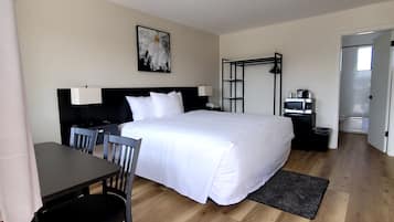 Habitación Deluxe, 1 cama de matrimonio grande | 1 dormitorio, sábanas de algodón egipcio, ropa de cama de alta calidad