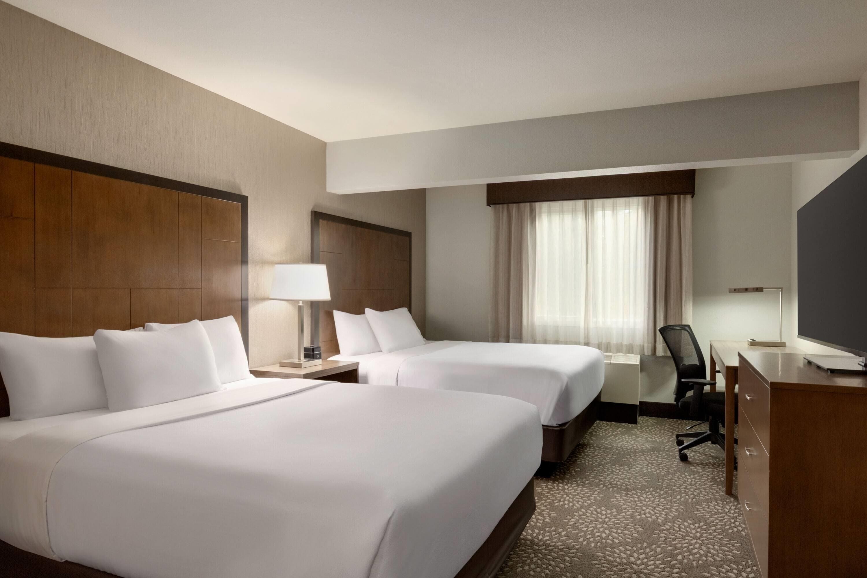 Deluxe Room, 2 Queen Beds, Non Smoking | Premium bedding, pillowtop beds, desk, laptop workspace