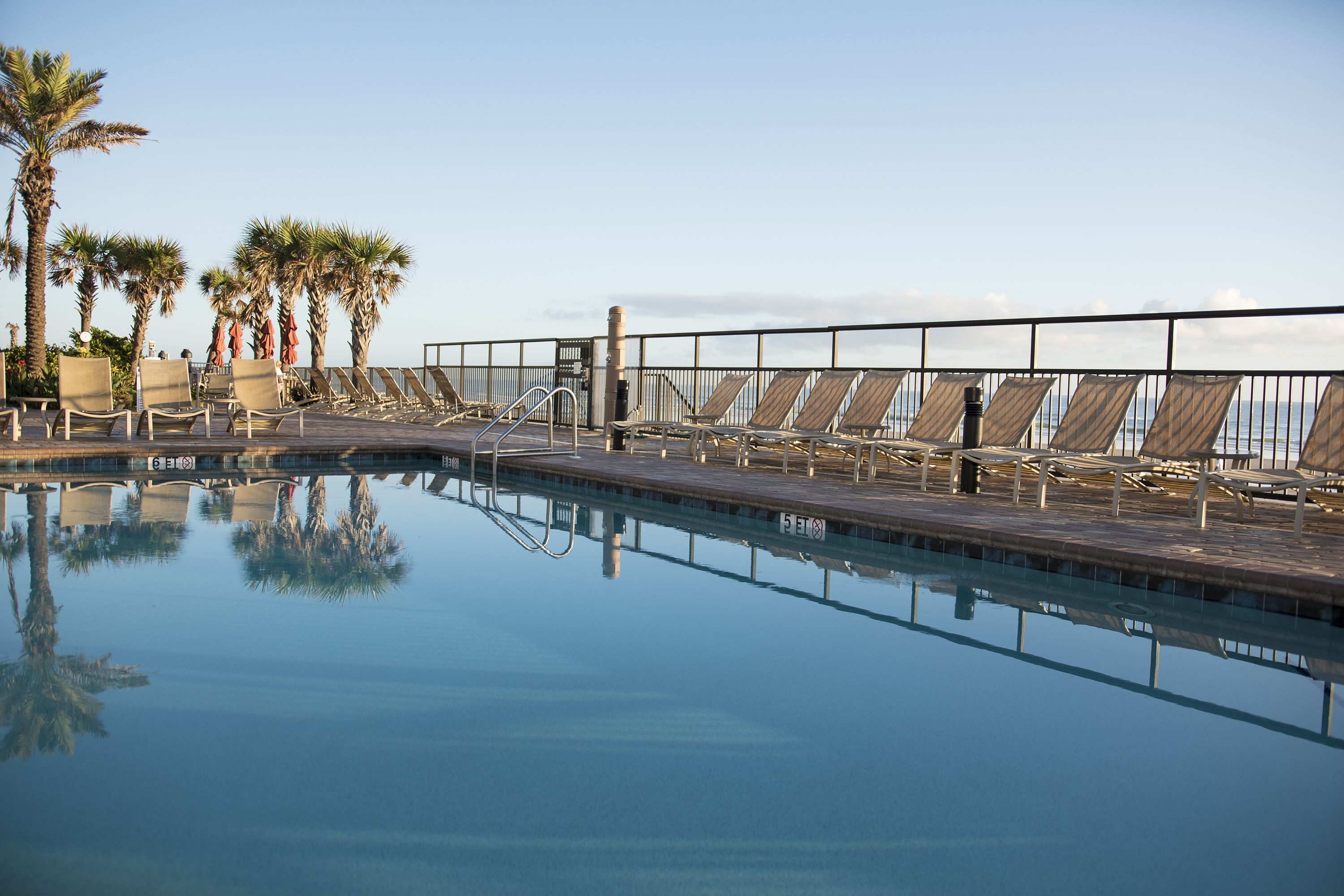 outdoor pool, pool umbrellas, pool loungers