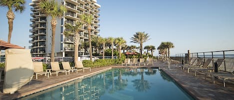 Outdoor pool, pool umbrellas, sun loungers