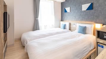 Twin Room, Non Smoking (Compact) | Desk, blackout drapes, soundproofing, free WiFi