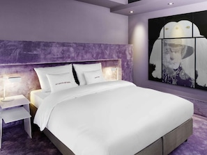 Kamer | Luxe beddengoed, donsdekens, een minibar, een kluis op de kamer