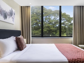 Deluxe Room, 1 Queen Bed | 2 bedrooms, cribs/infant beds, free WiFi, bed sheets