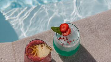 Outdoor pool, pool umbrellas, pool loungers